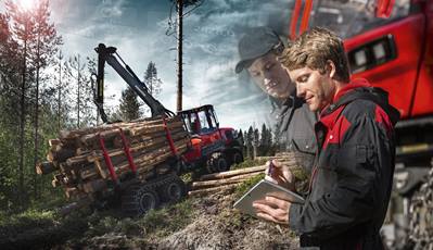 Two men in front of forest machine